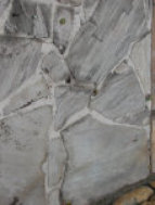 A picture from above of gray irregular flagstone pavers.