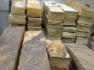 A picture of brown and tan Tennessee rubble flagstone.